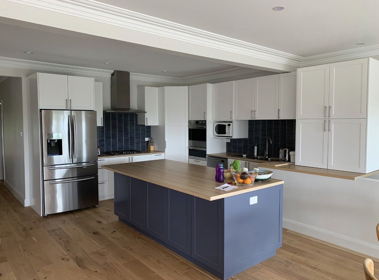Shaker Kitchen with Navy Island — Cabinets by Oaktree custom cabinetry