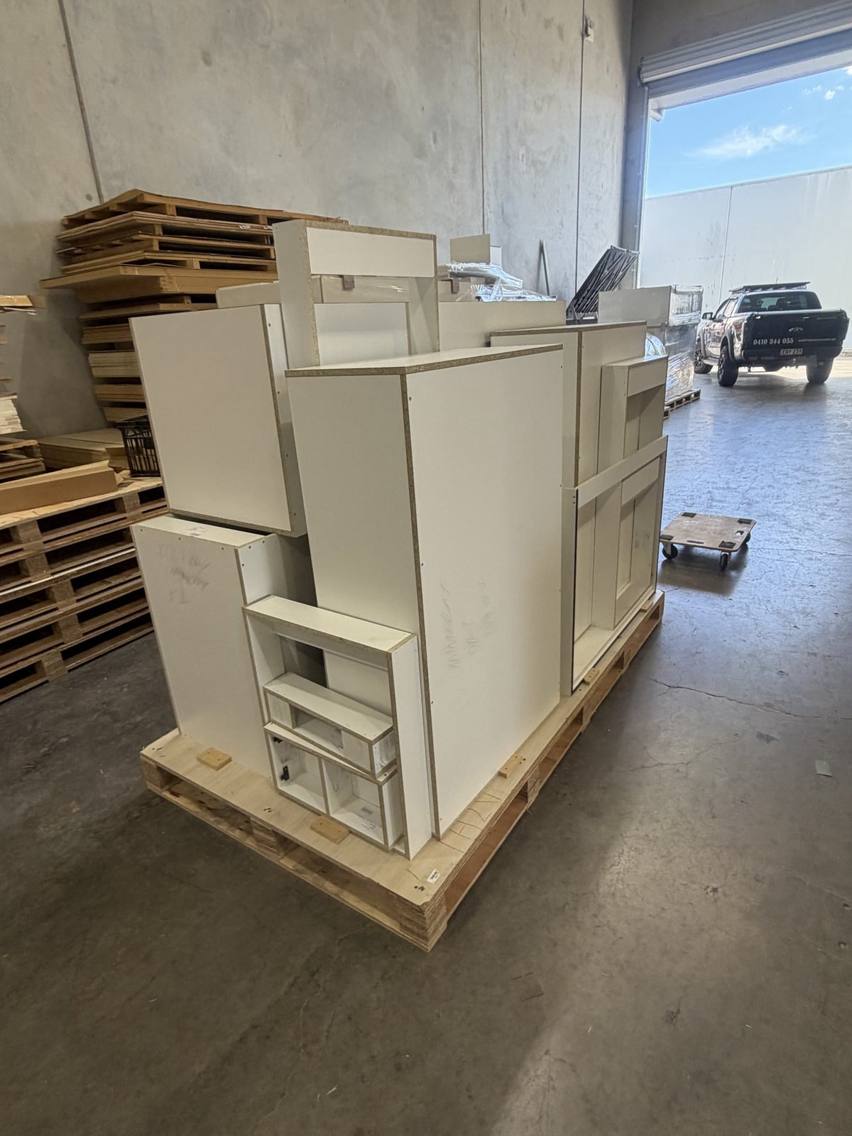 Cabinet Parts Palletised for Delivery — Cabinets by Oaktree custom cabinetry
